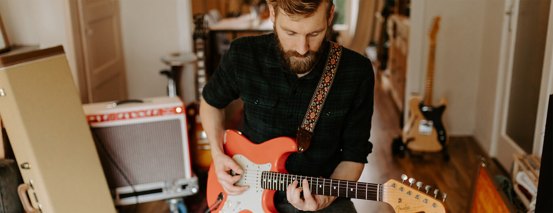 Paul Davids playing guitar