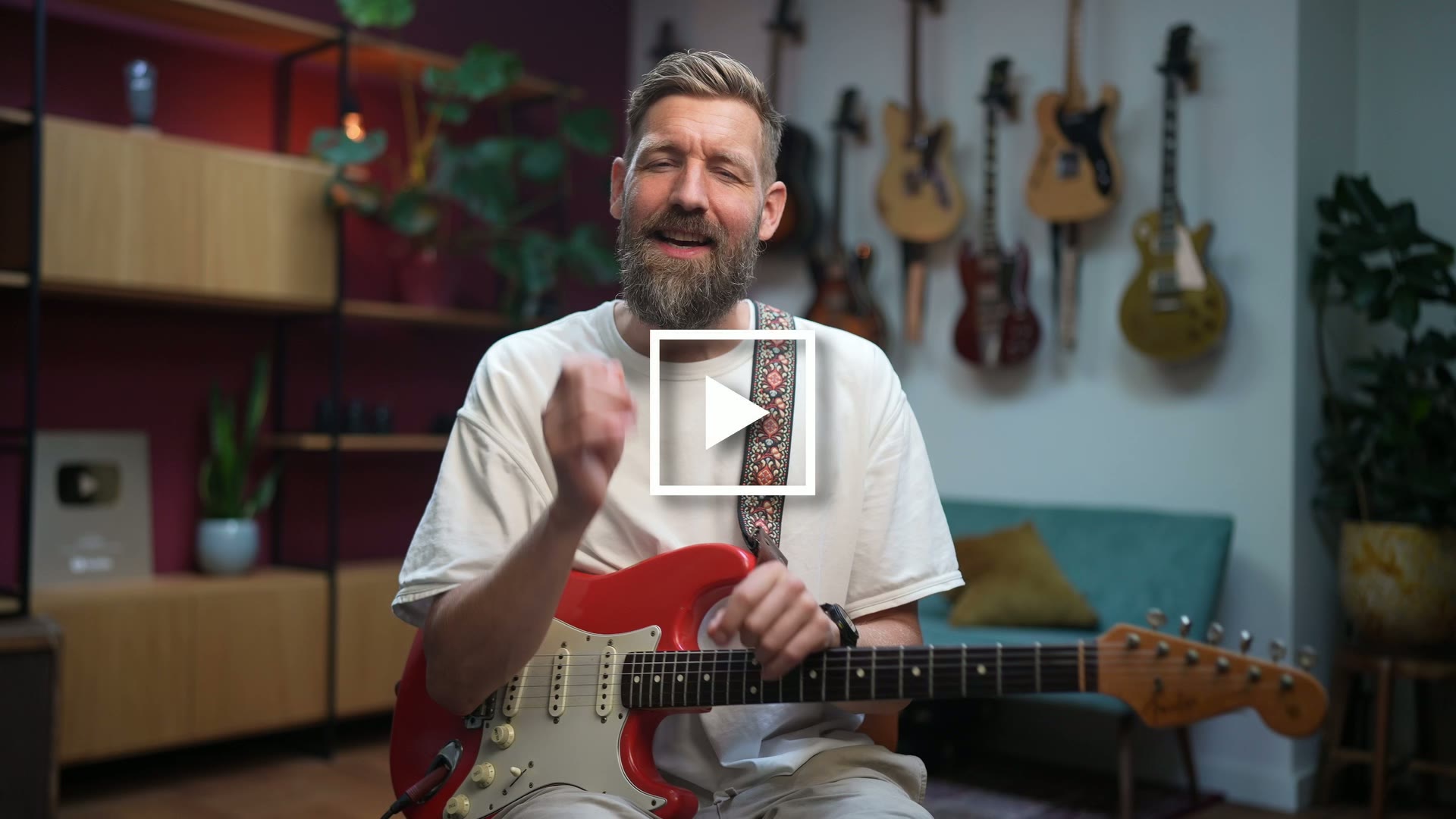 Paul Davids playing guitar.